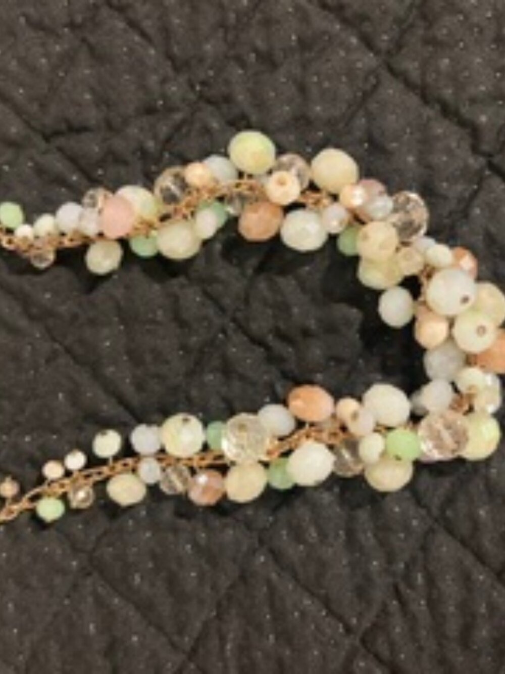 multi-strand cluster or "cha cha" style statement necklace